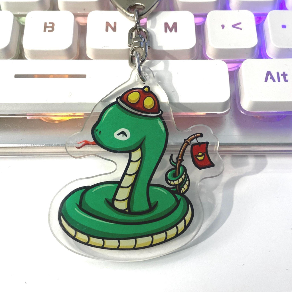 Acrylic Year of the Snake Wearing Hat Holding a stick with a Red Li Xi Envelope Cute Keychain